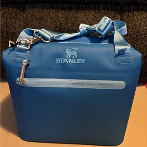 Blue Stanley insulated cooler bag with adjustable strap